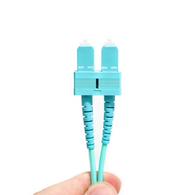 Chaqueta con varios modos de funcionamiento a dos caras 3.0m m OM3 del cordón de remiendo de la fibra de Wathet SU-UPC Ject 50/125um LSZH
